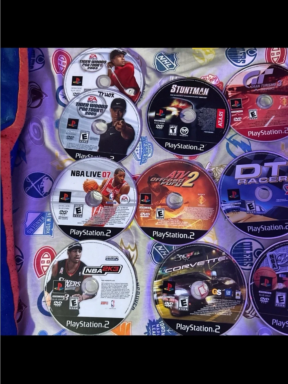 Sony PlayStation 2 Slim Bundle with Black Console and Multicolored Game Discs